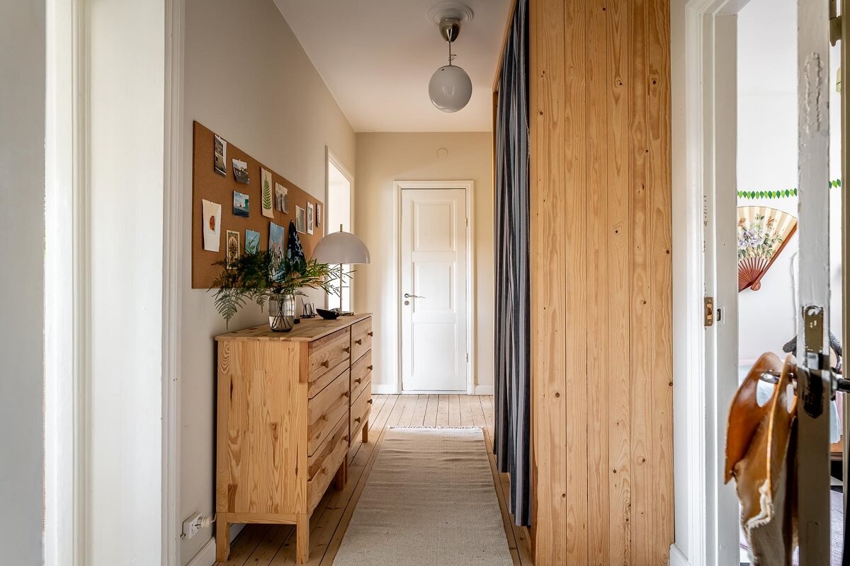 Colorful Decor in a Scandinavian Apartment 17 hallway-wooden-dresser-wardrobes