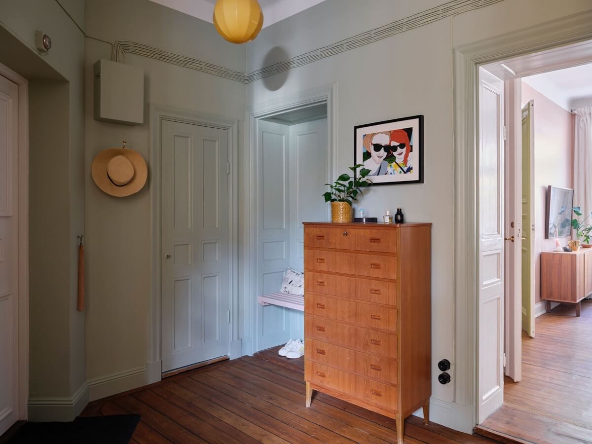 A Scandi Apartment Mixes Vintage with Contemporary Design 25 hallway-wooden-floor-nordroom