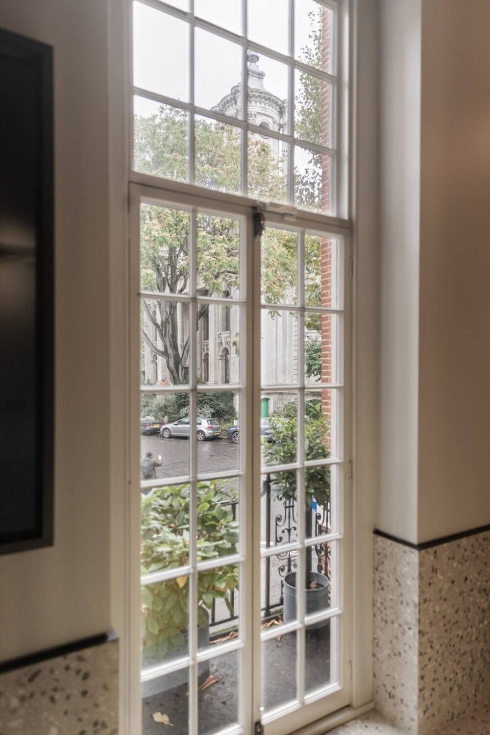 A Unique London Home with Terrazzo Tiles and a Roof Terrace 12 historic windows london home nordroom