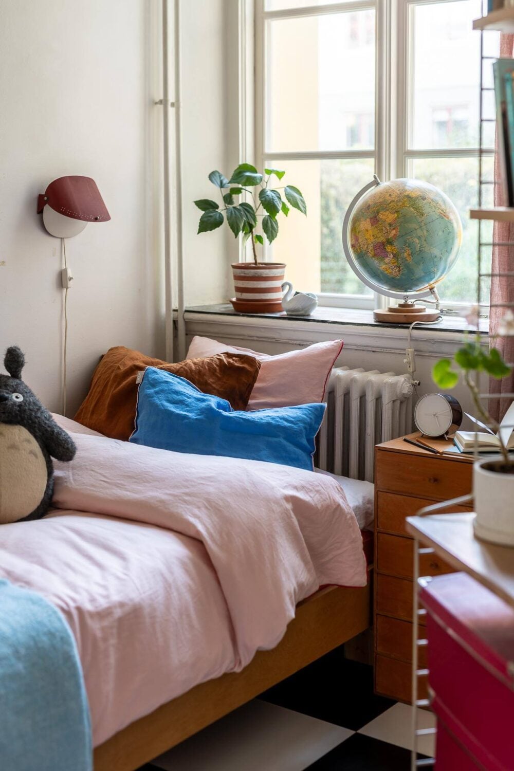 Colorful Decor in a Scandinavian Apartment 22 kids-bedroom-detail-pink-bedding-checkerboard-rug