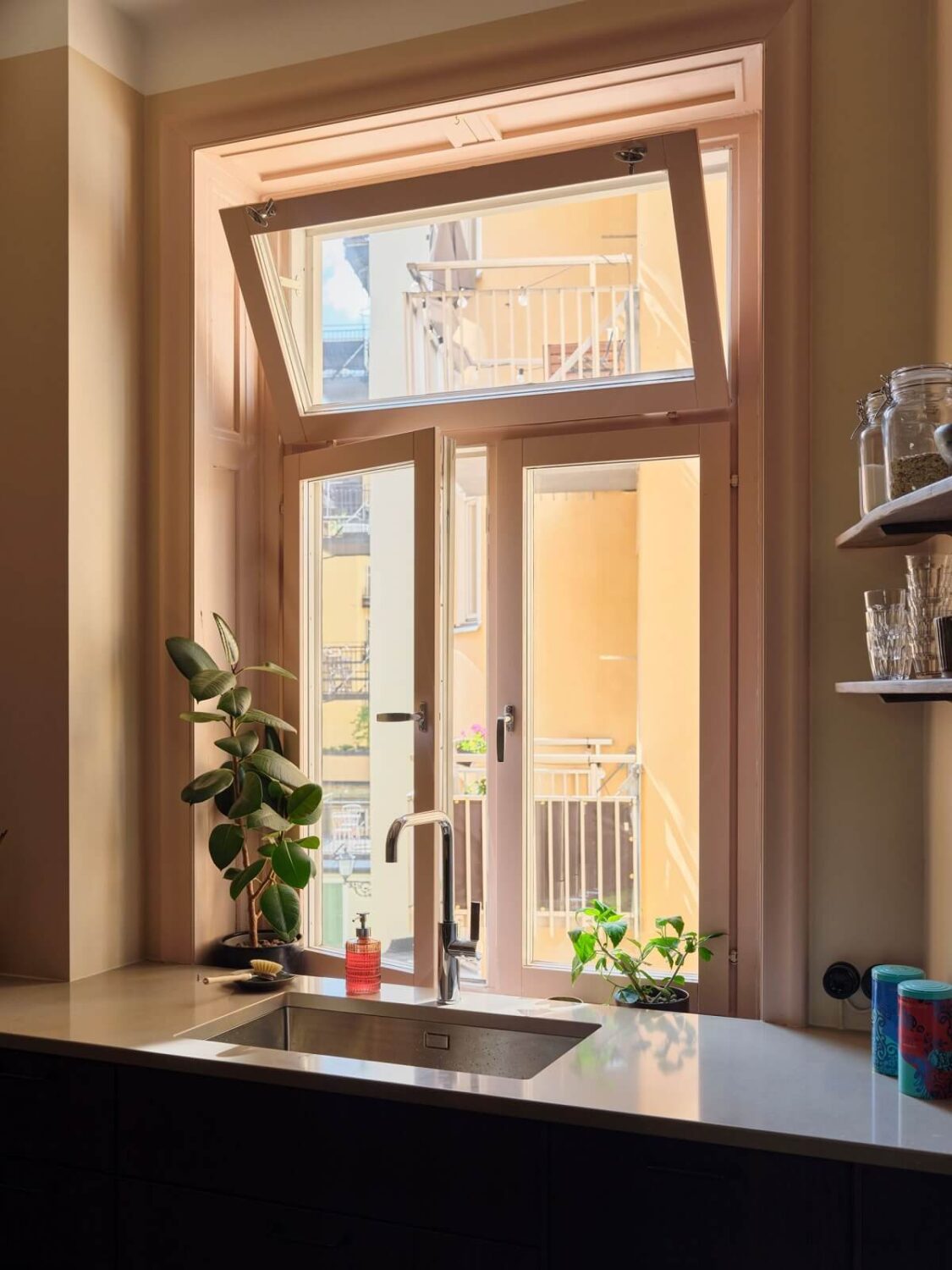 A Scandi Apartment Mixes Vintage with Contemporary Design 19 kitchen-sink-under-window-nordroom
