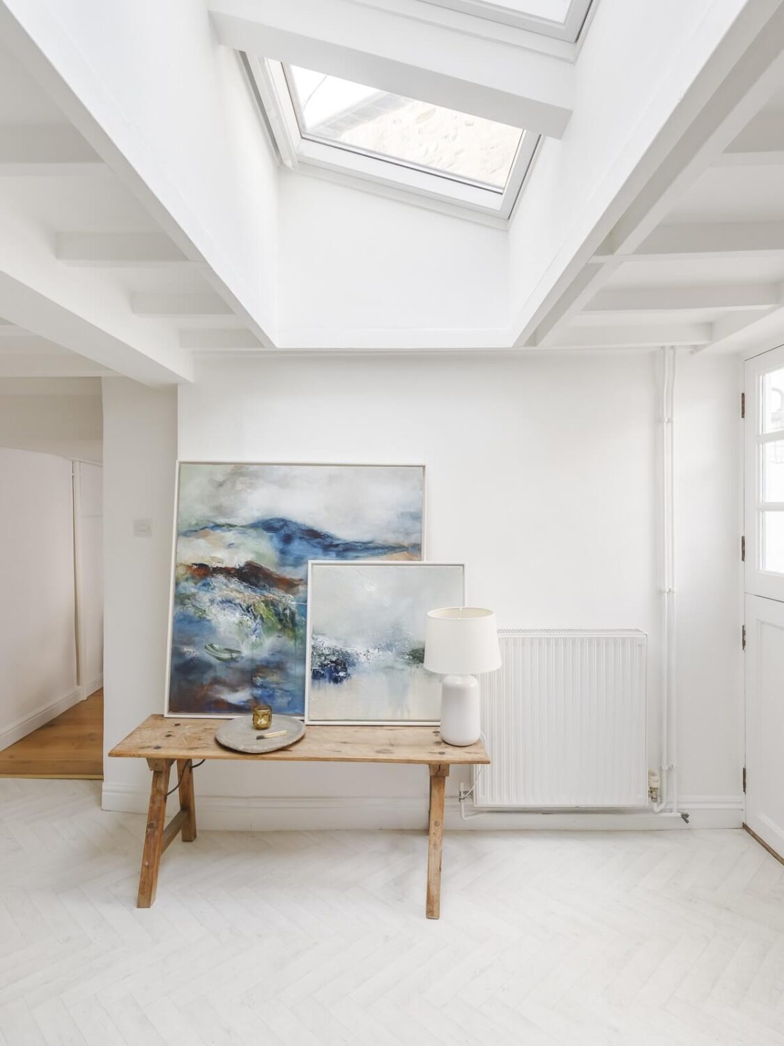 A Light Coastal Home in England 9 kitchen space with skylight coastal home