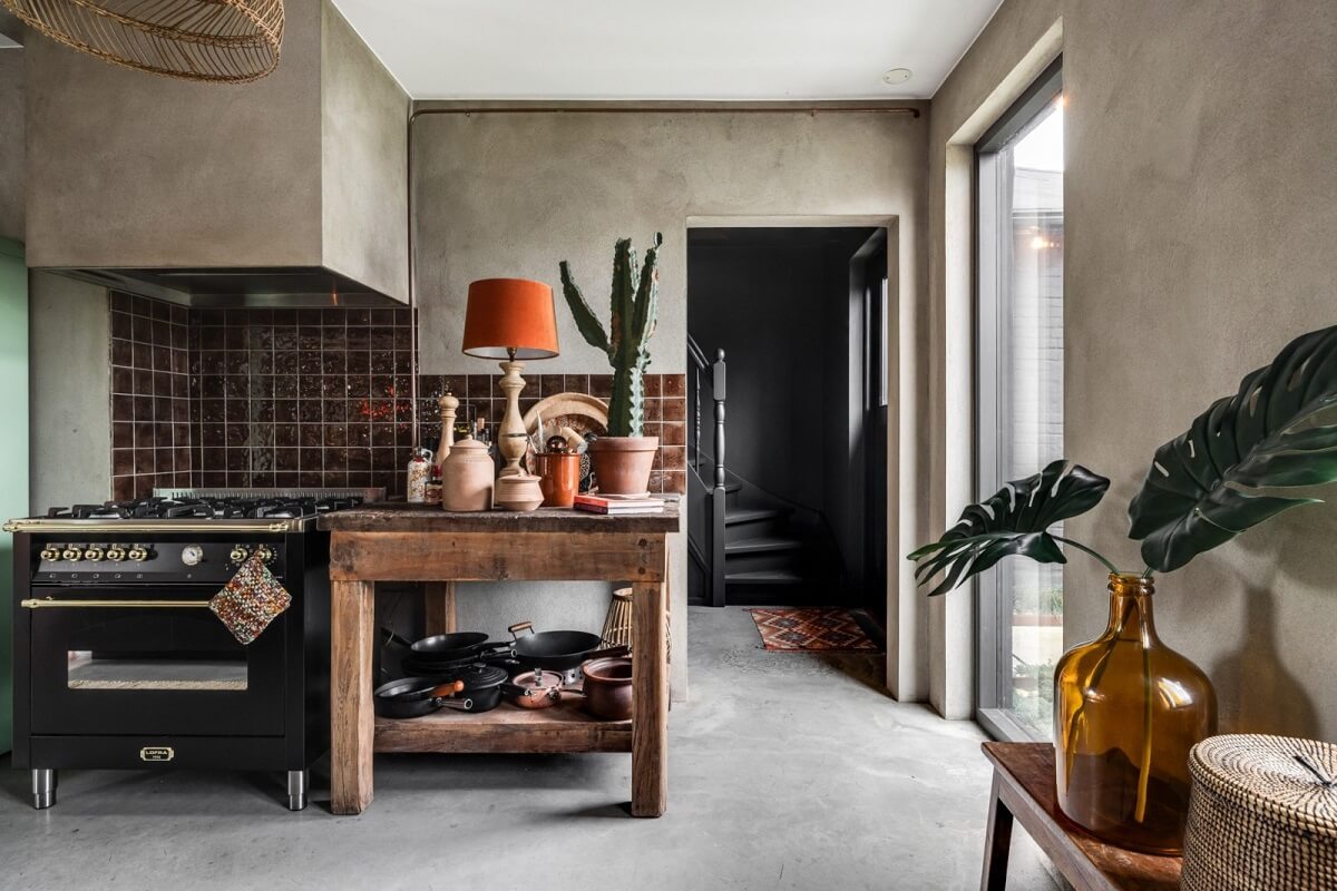 A Unique Bohemian Family Home in a Former Swedish Bakery 13 kitchen-wooden-butcher-block-burgundy-tiles-nordroom