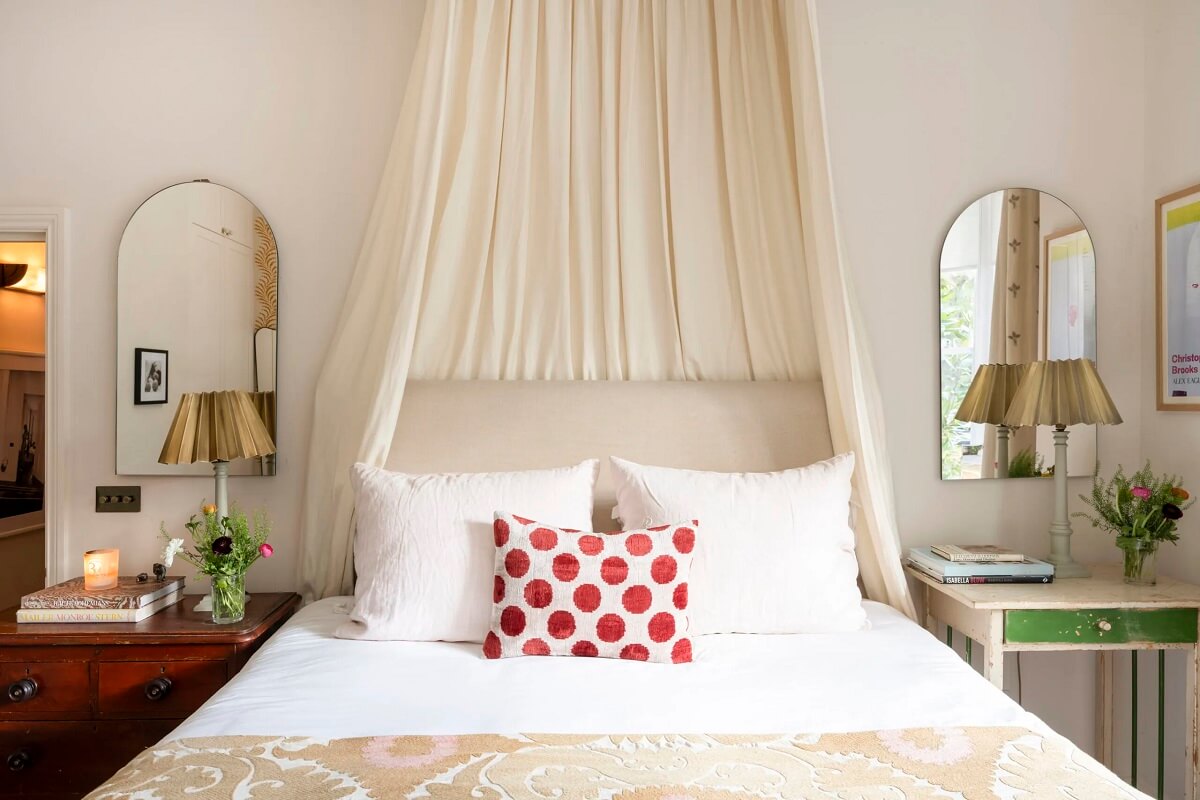 A Light Apartment with Arched Windows and a Garden in Maida Vale 9 light bedroom canopy bed maida vale apartment nordroom