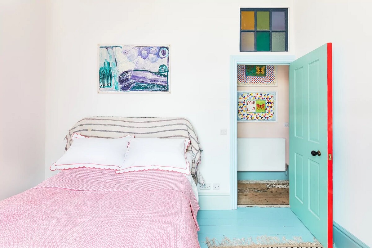 A Playful Colorful Eclectic Artist Home in London 24 light bedroom pastel color accents