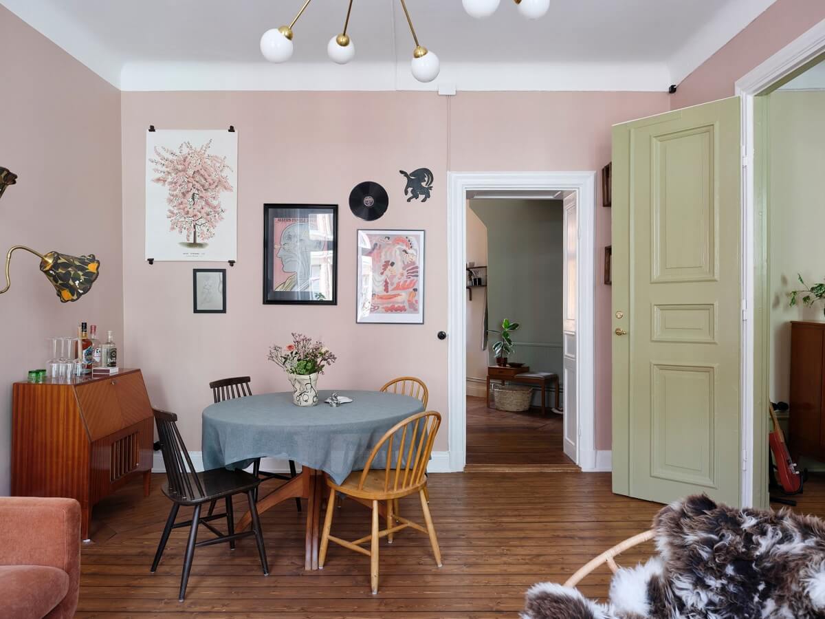 A Scandi Apartment Mixes Vintage with Contemporary Design 6 light-pink-living-room-round-dining-table-nordroom