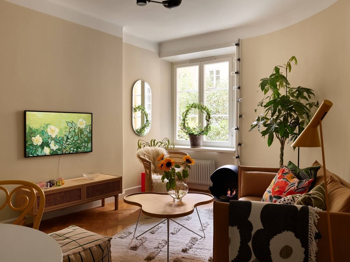 A Serene Light Colored Apartment with Bright Color Pops 9 living room beige walls scandinavian design