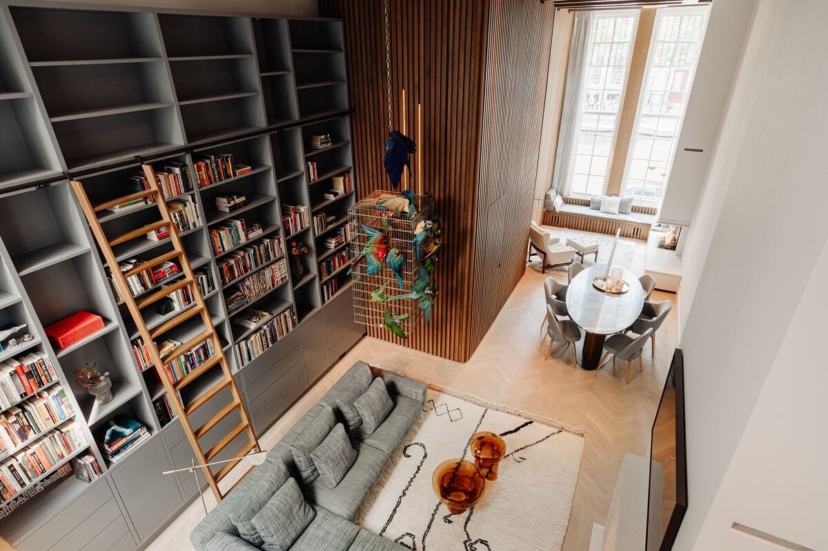 A Luxurious Amsterdam Canal House with High Ceilings 2 living room bookcases high ceilings