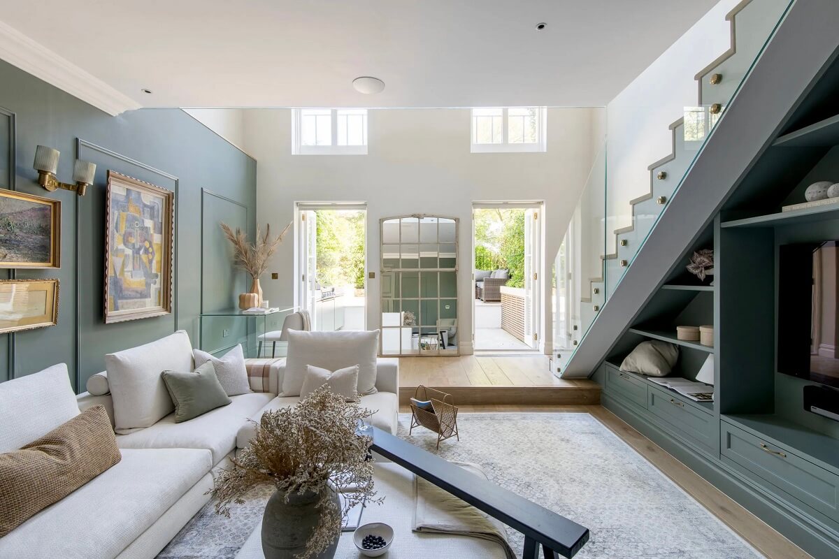 Muted Colors and Classic Design in a London Townhouse 1 living-room-duck-egg-blue-walls-built-in-cabinets-nordroom