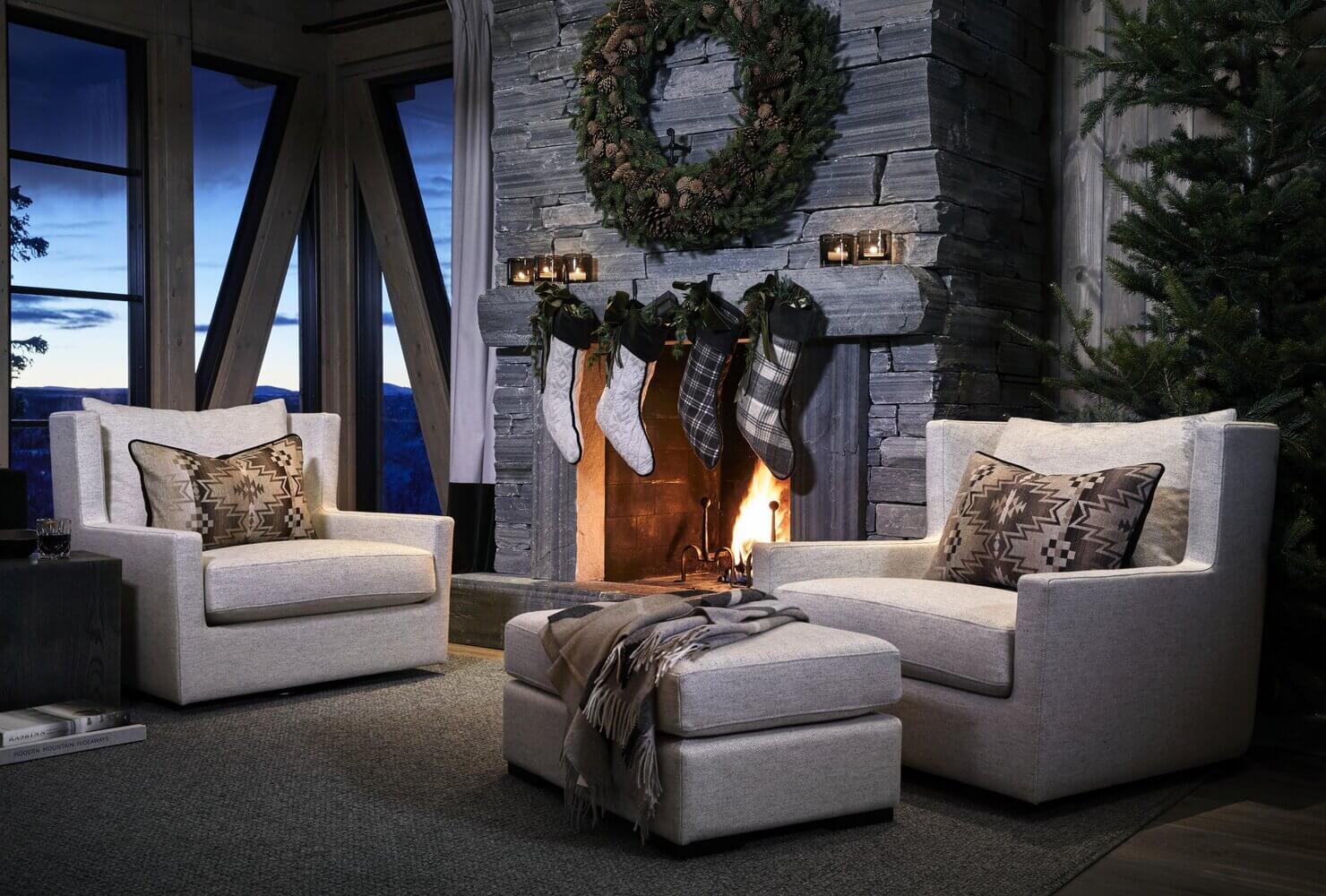 A Modern Norwegian Log House Decorated for Christmas 2 living room log home stone fireplace christmas decor nordroom