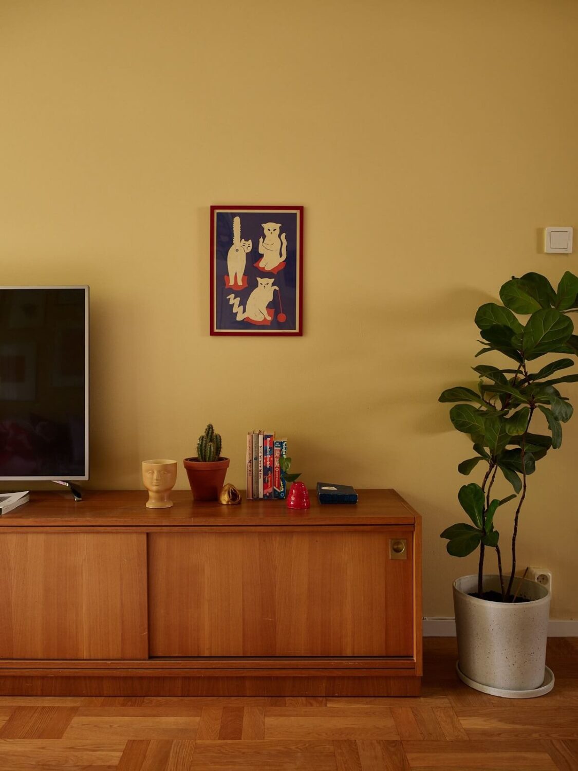 Soft Yellow Walls in a Swedish Apartment 7 living-room-wooden-floor-pale-yellow-walls-nordroom