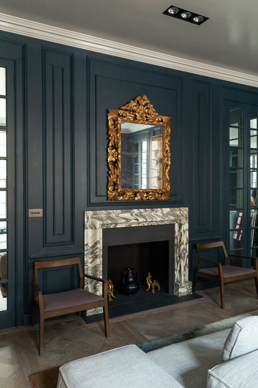 A Unique London Home with Terrazzo Tiles and a Roof Terrace 7 marble fireplace gilded mirror living room
