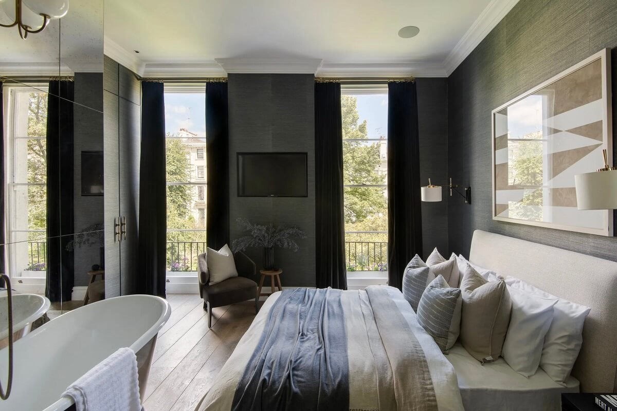 Muted Colors and Classic Design in a London Townhouse 13 master-bedroom-dark-gray-wallpaper-metal-coated-bath-nordroom