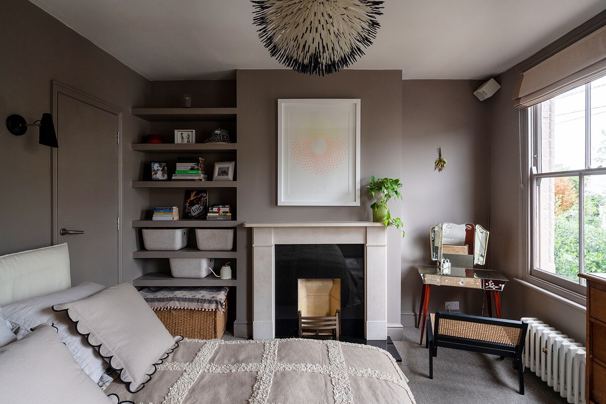A Green and Pink London Townhouse with A Modern Extension 14 master-bedroom-fireplace-shelves-nordroom