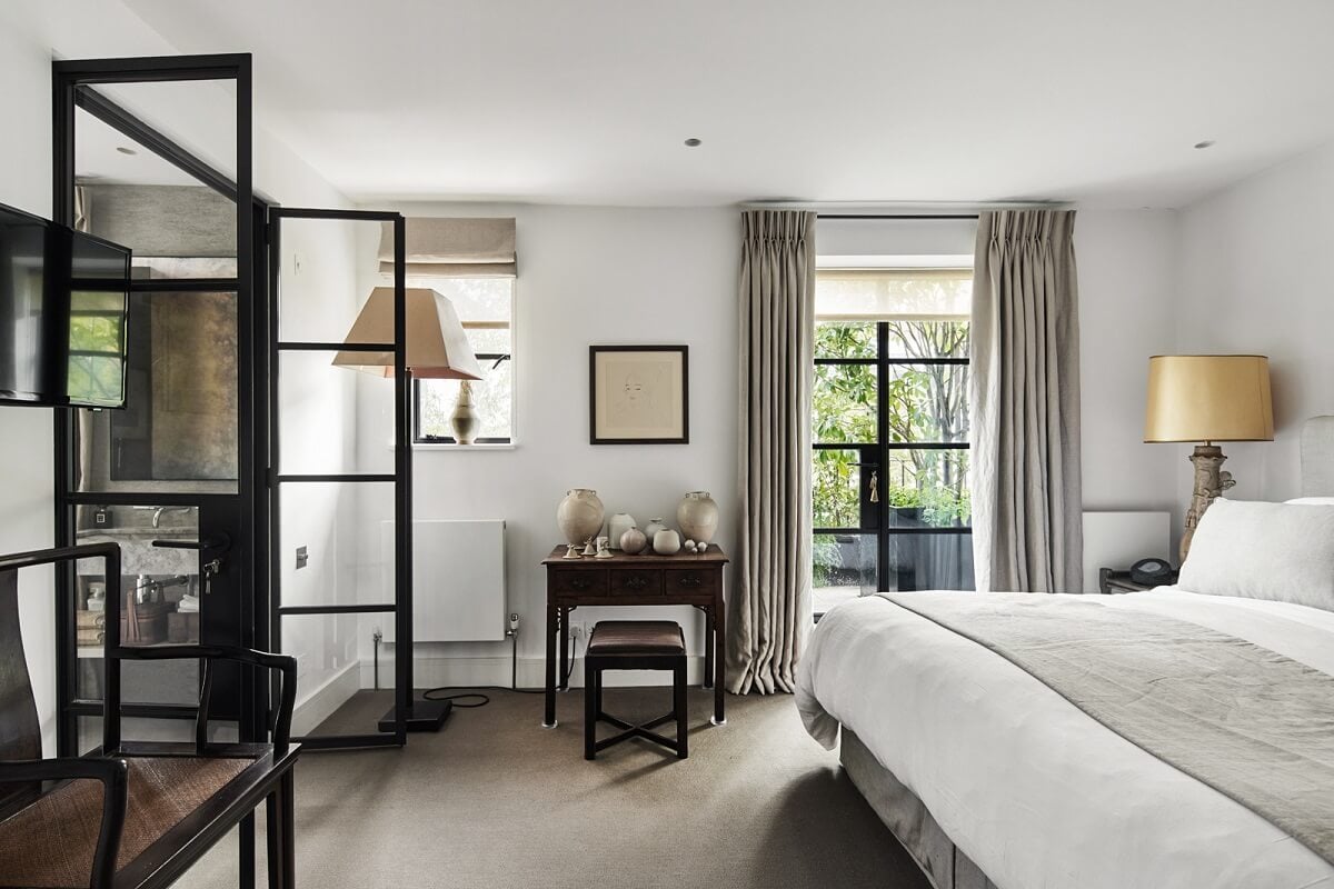 Stylish Monochrome Interiors in an Early 20th Century House 17 master-bedroom-steel-glass-doors-nordroom