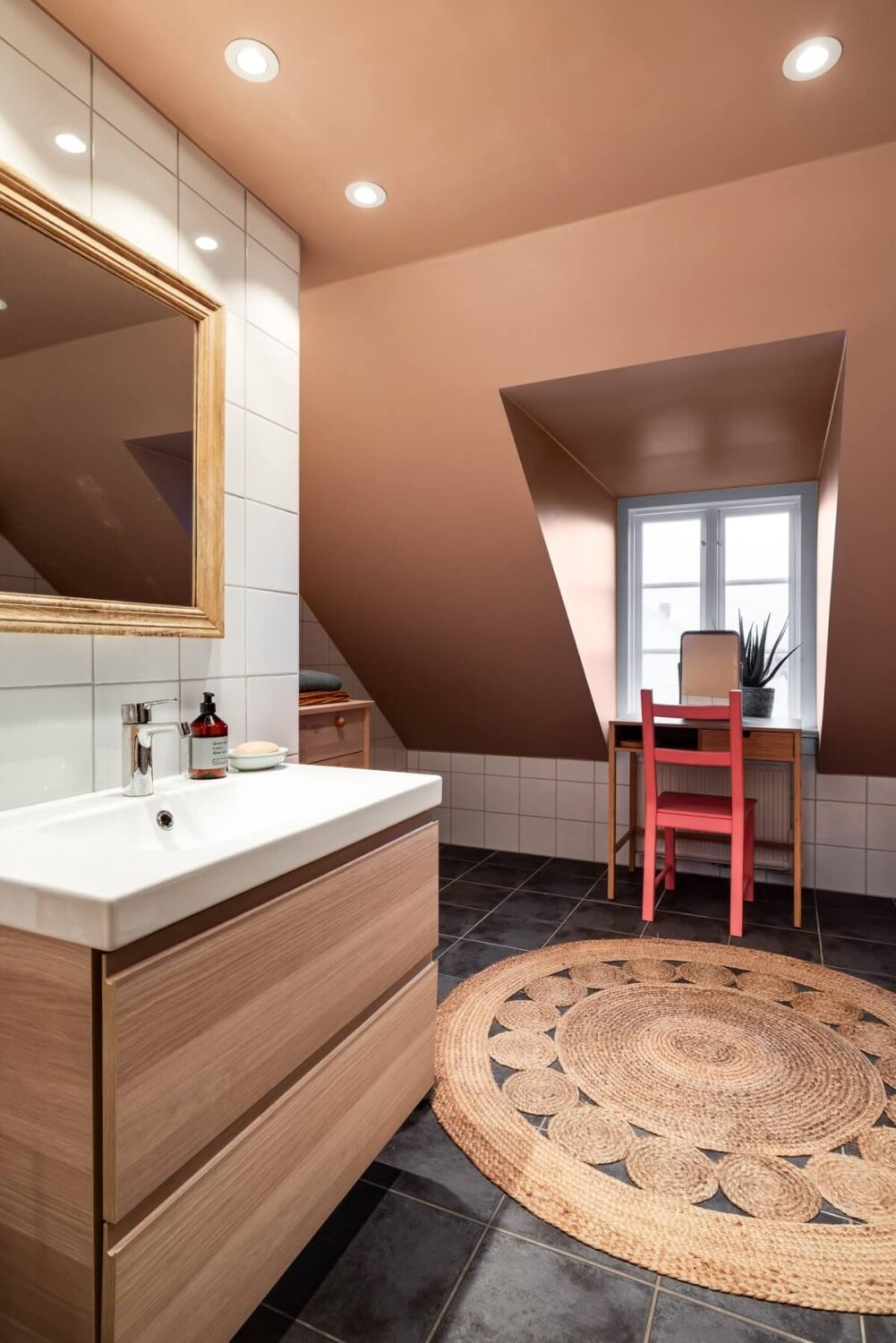 A Unique Bohemian Family Home in a Former Swedish Bakery 37 modern-attic-bathroom-slanted-ceilings-pink-walls-nordroom