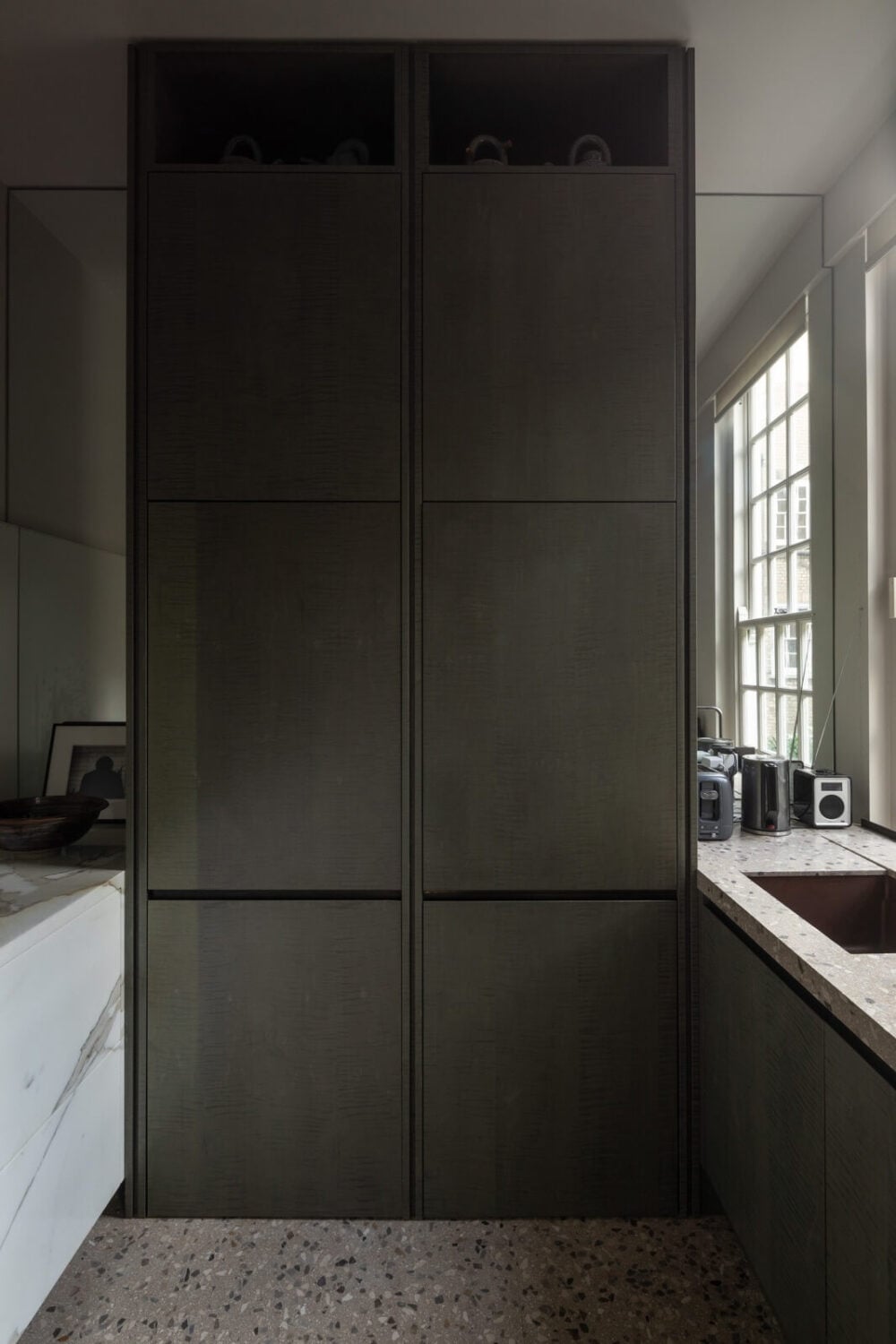 A Unique London Home with Terrazzo Tiles and a Roof Terrace 15 modern galley kitchen terrazzo floor tiles