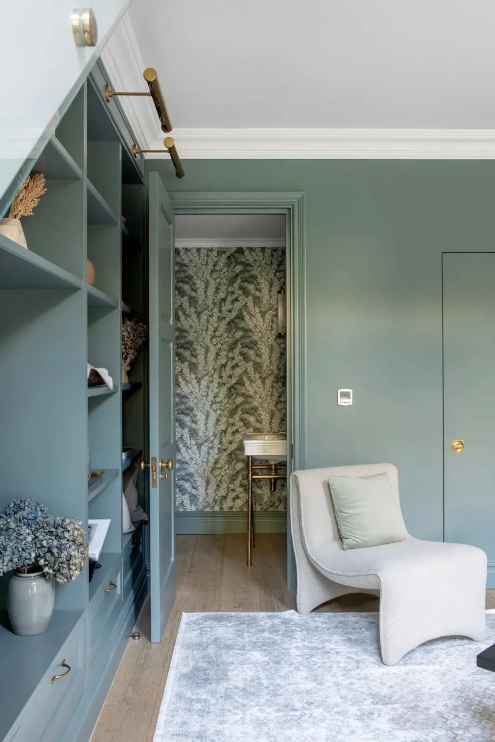 Muted Colors and Classic Design in a London Townhouse 6 muted-blue-living-room-built-in-cabinets-nordroom
