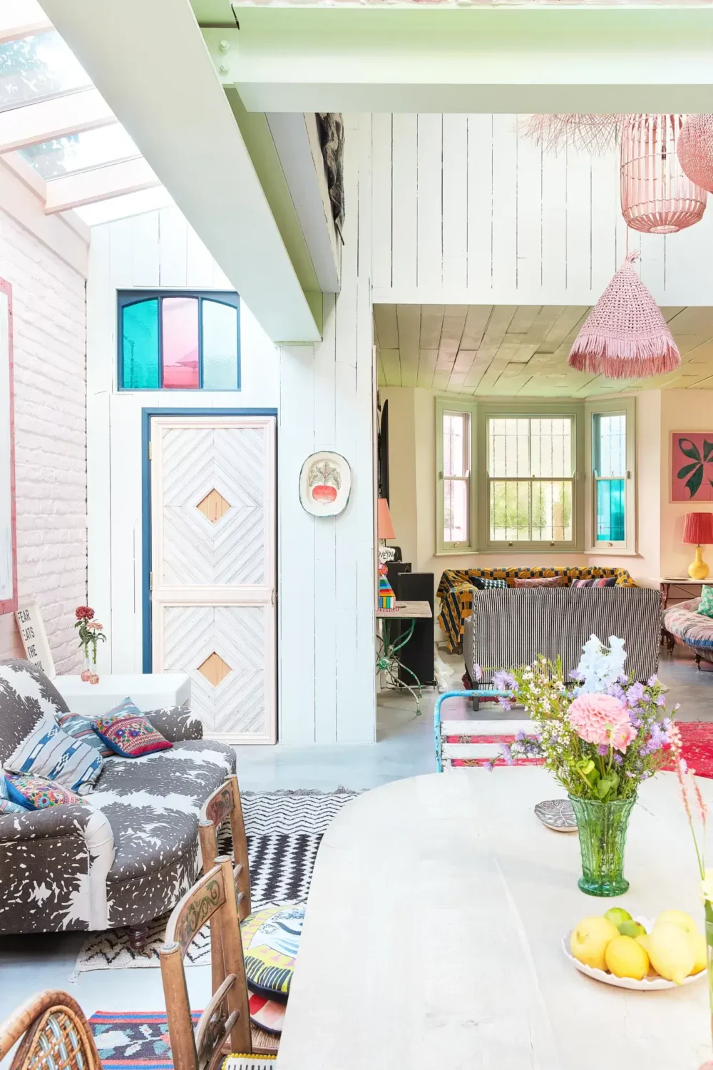 A Playful Colorful Eclectic Artist Home in London 11 open plan living room dining table nordroom