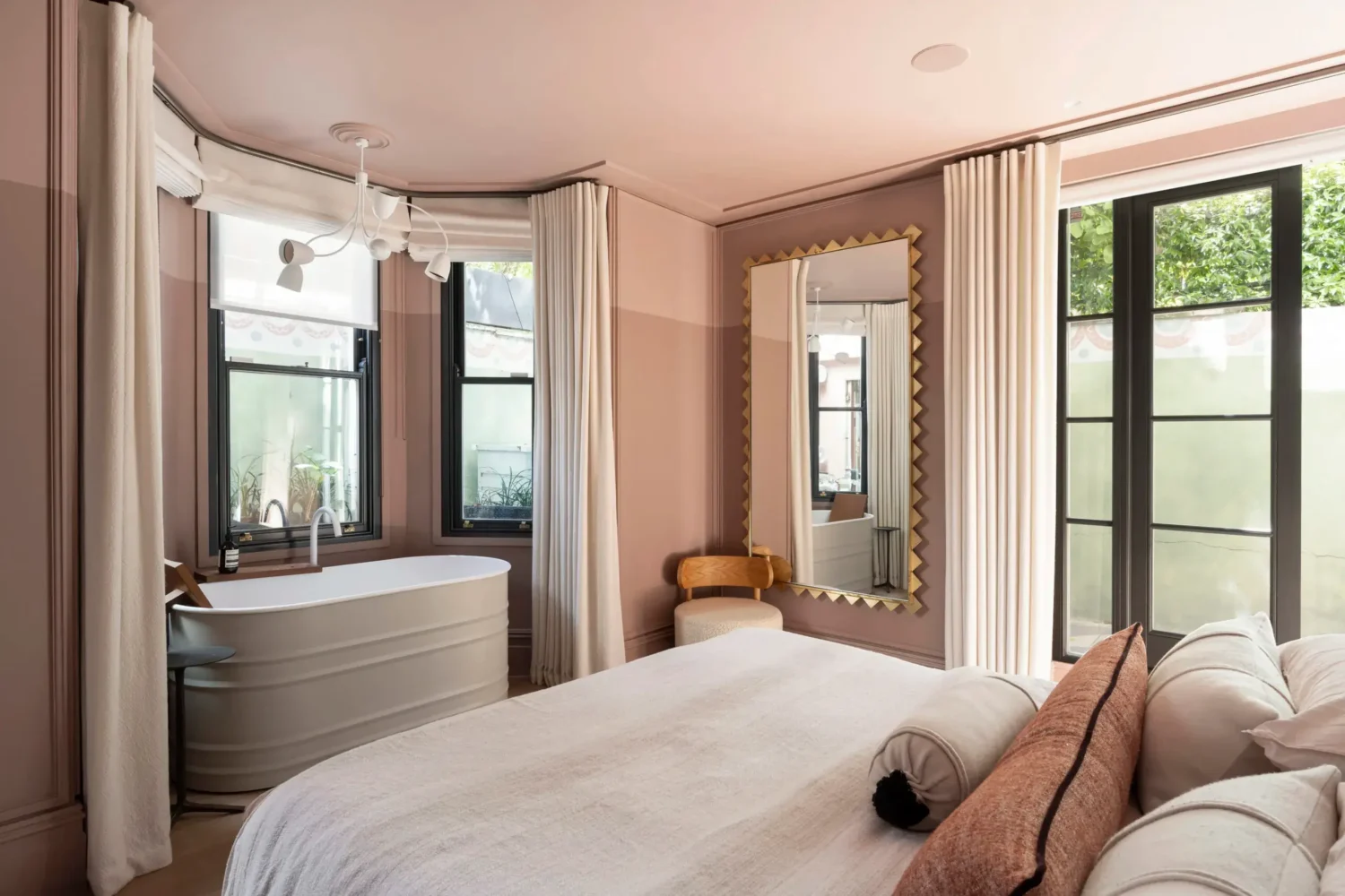An Award-Winning Apartment with Color Accents in Notting Hill 12 pink-bedroom-bay-window-freestanding-bath-nordroom