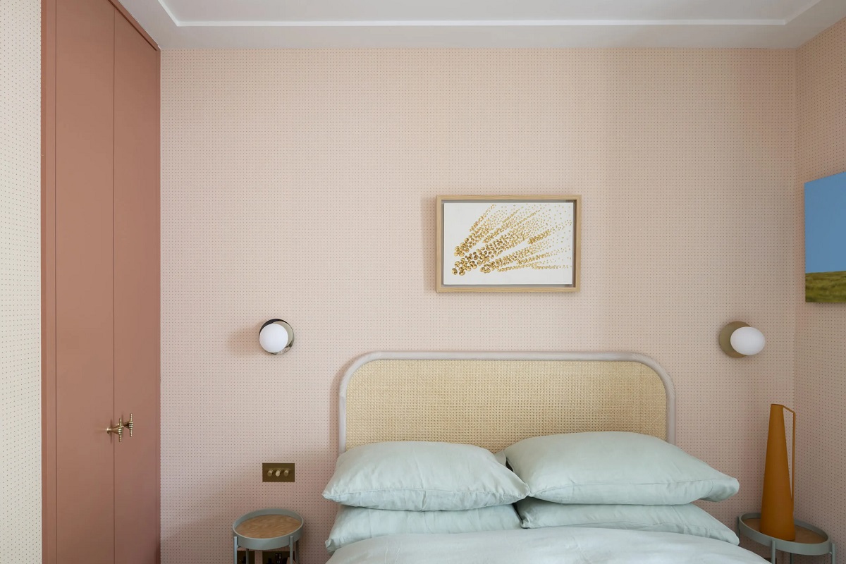 An Award-Winning Apartment with Color Accents in Notting Hill 16 pink-bedroom-rattan-headboard-nordroom