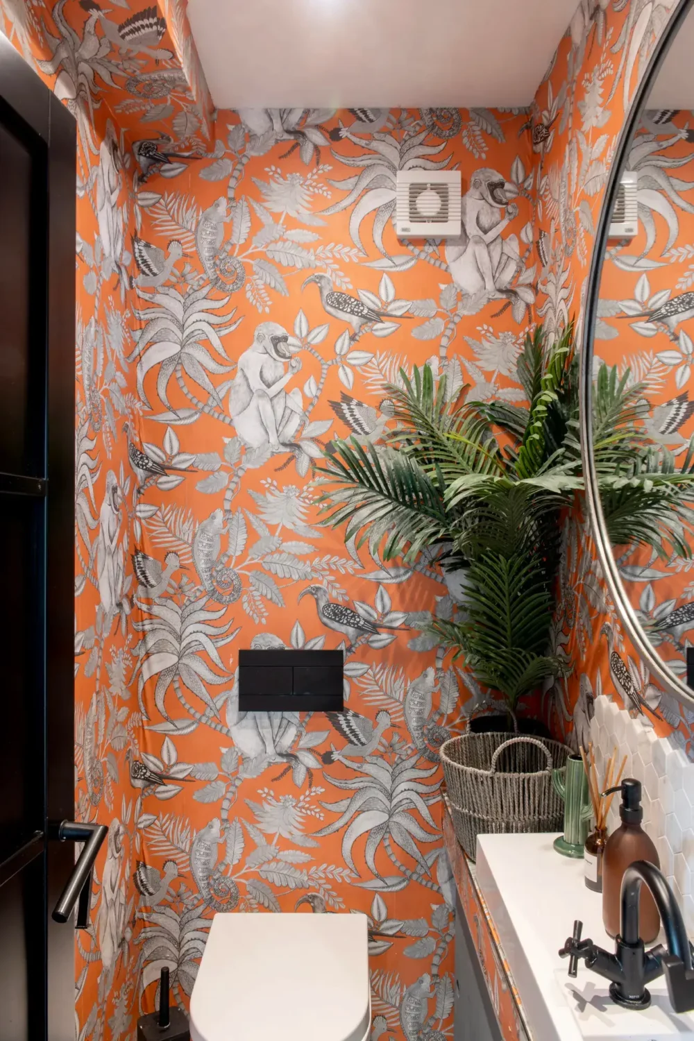 A Spacious and Stylish Houseboat in London 7 powder room orange wallpaper houseboat nordroom
