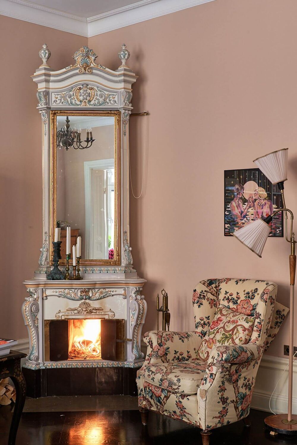 A Romantic Apartment with Original Details 6 romantic-living-room-pink-walls-fireplace-floral-armchair-nordroom