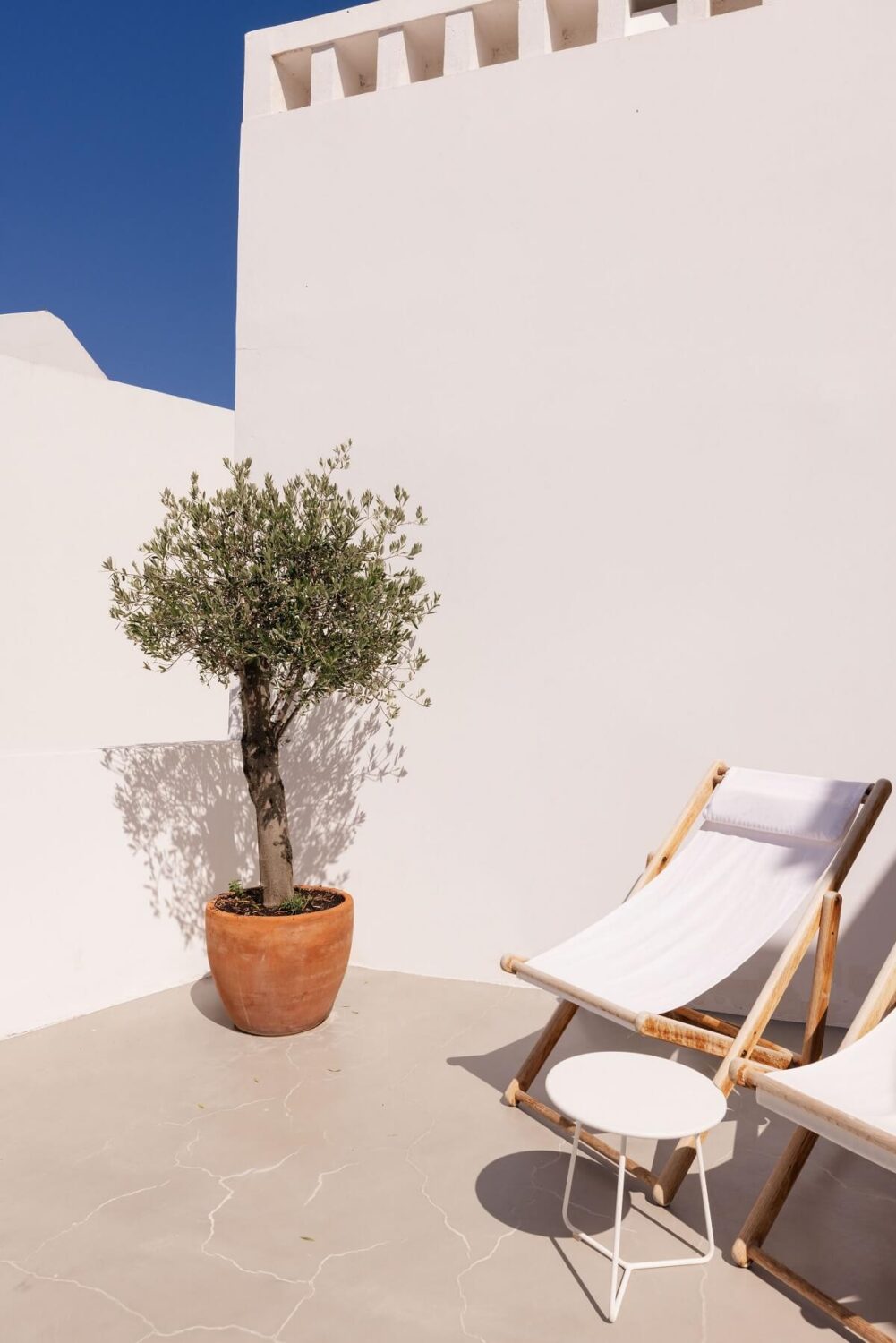 A Renovated 19th Century House with a Minimalistic Decor 13 roof-terrace-seating