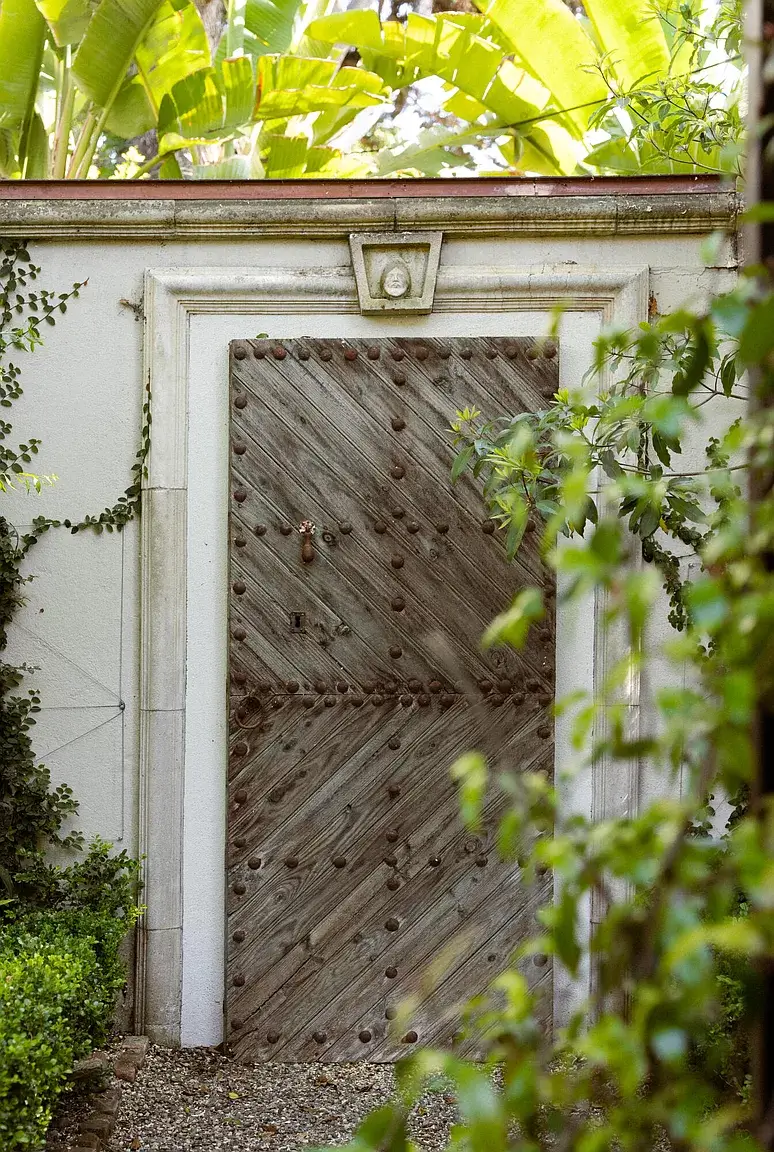 A Cozy Montecito Home Once Owned by Larry David 29 rustic wooden door