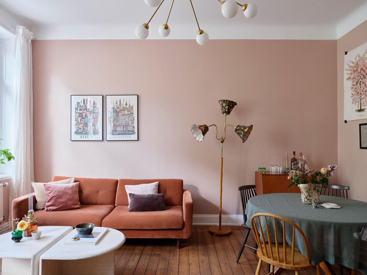 A Scandi Apartment Mixes Vintage with Contemporary Design 2 scandi-living-room-light-pink-walls-round-table-nordroom