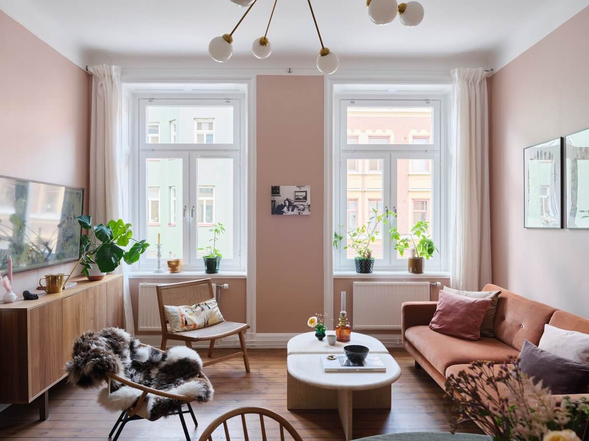 A Scandi Apartment Mixes Vintage with Contemporary Design 3 scandinavian-living-room-light-pink-walls-nordroom