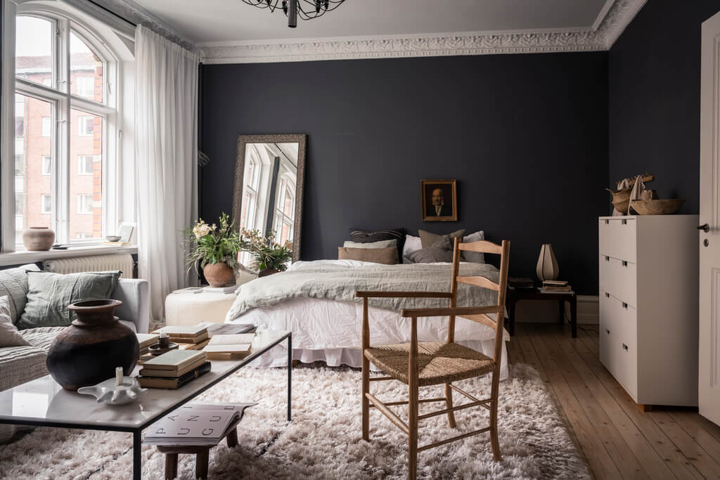 A Scandinavian Studio Apartment with Black Walls 6 scandinavian studio apartment black walls wooden floor