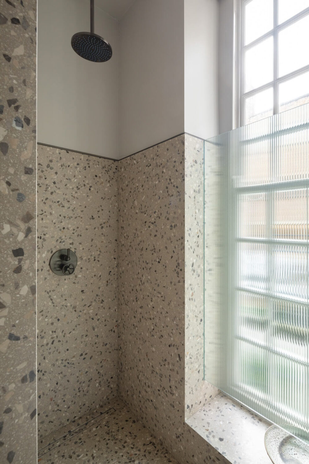 A Unique London Home with Terrazzo Tiles and a Roof Terrace 23 shower terrazzo tiles