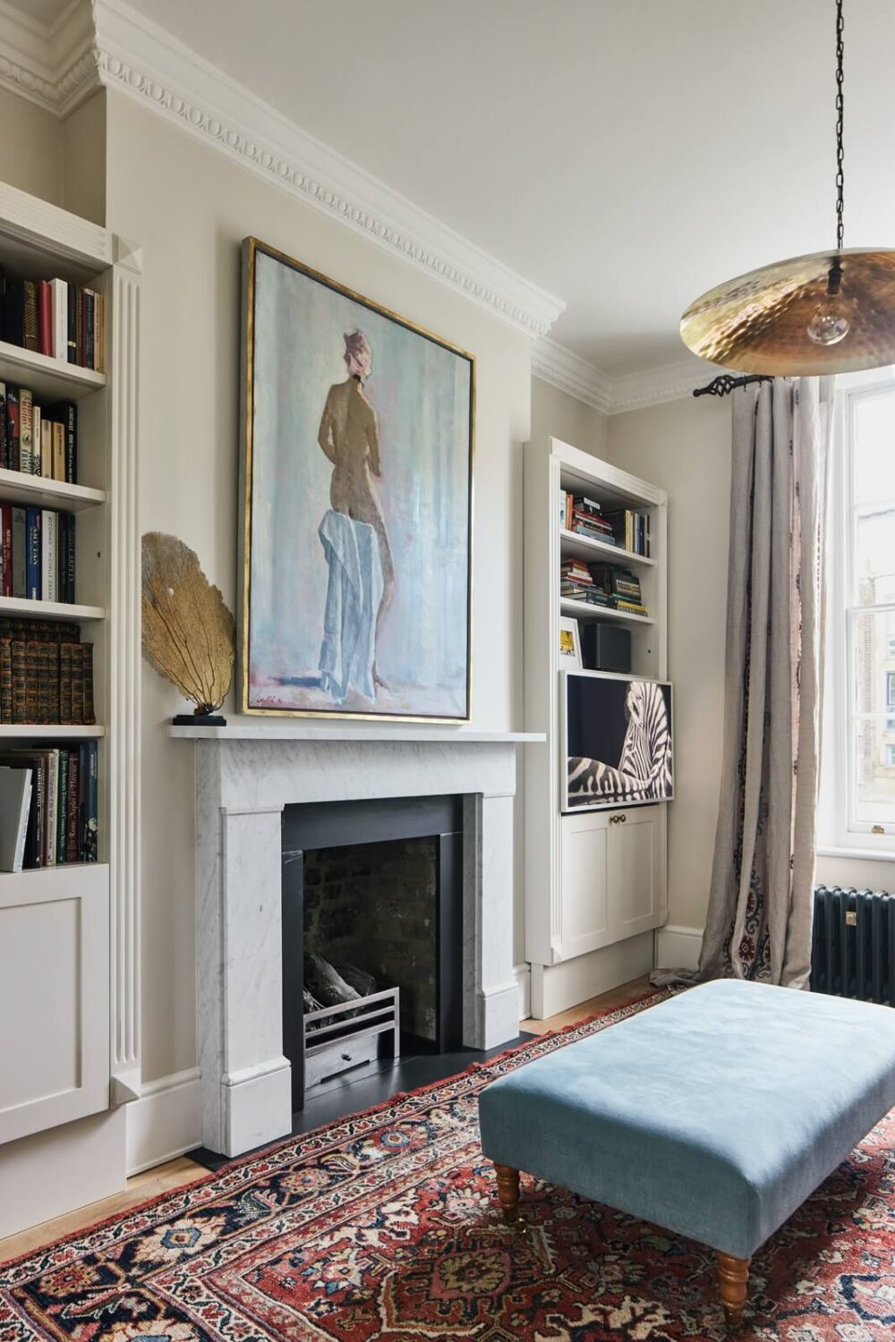 Blue Color Accents in a Restored London Townhouse 5 snug-tv-room-london-townhouse-nordroom