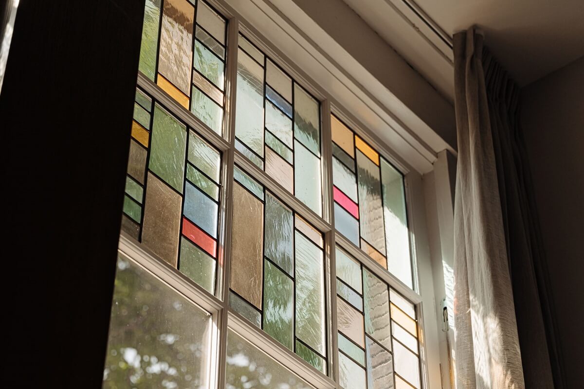 A Luxurious Amsterdam Canal House with High Ceilings 6 stained glass window canal house amsterdam