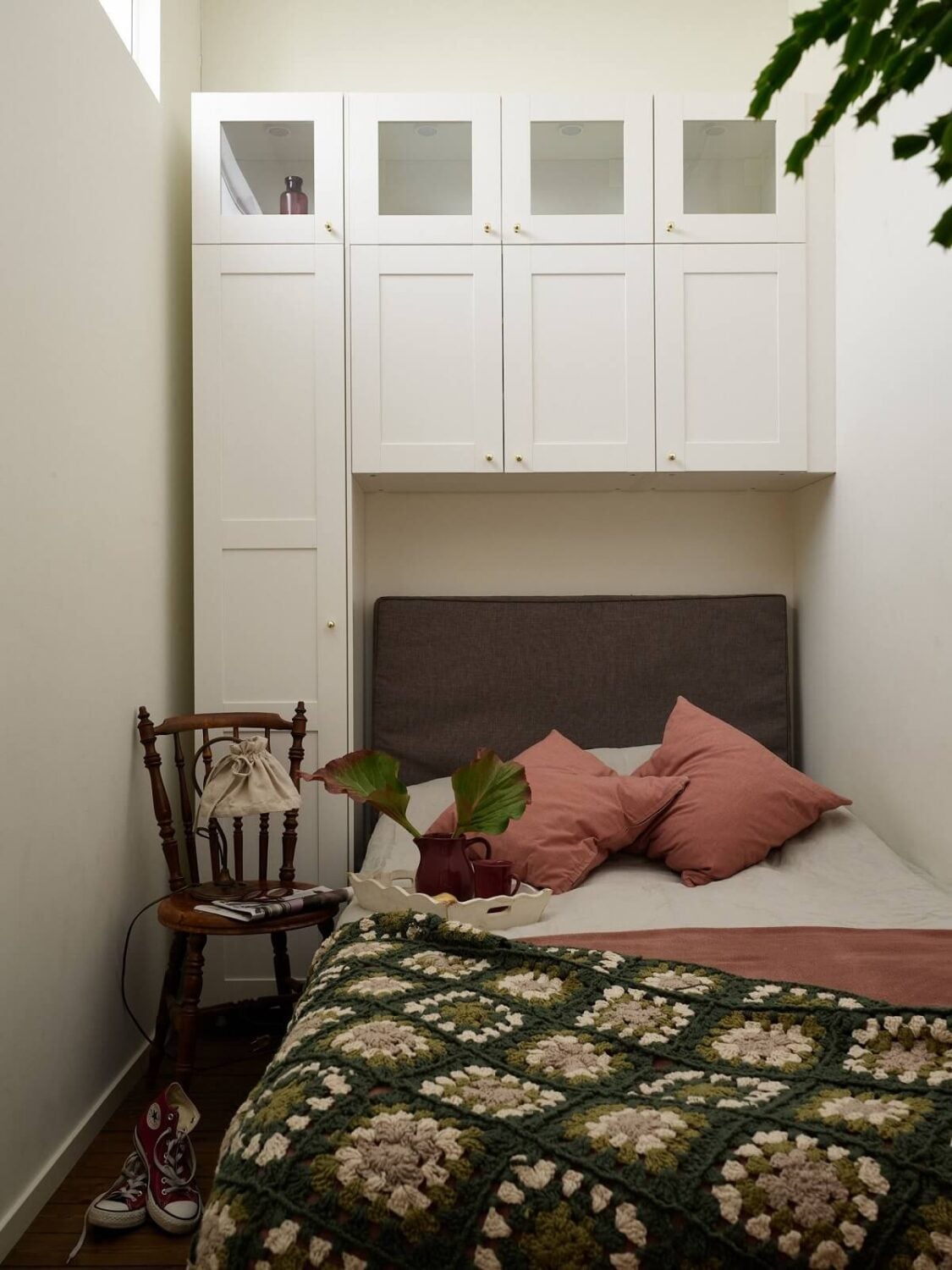A Warm Vintage Apartment in Stockholm 14 tiny-bedroom-wardrobes-above-the-bed-nordroom