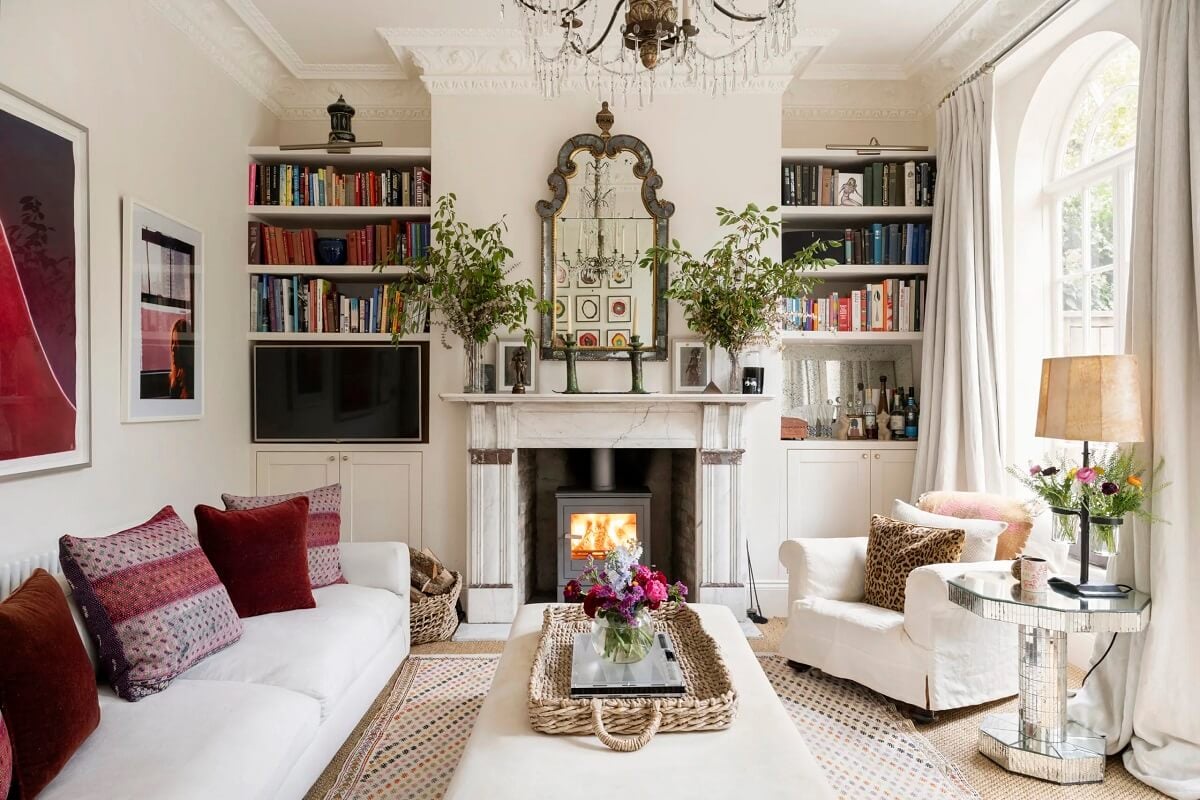 A Light Apartment with Arched Windows and a Garden in Maida Vale 1 white living room arched windows fireplace bookshelf niches nordroom