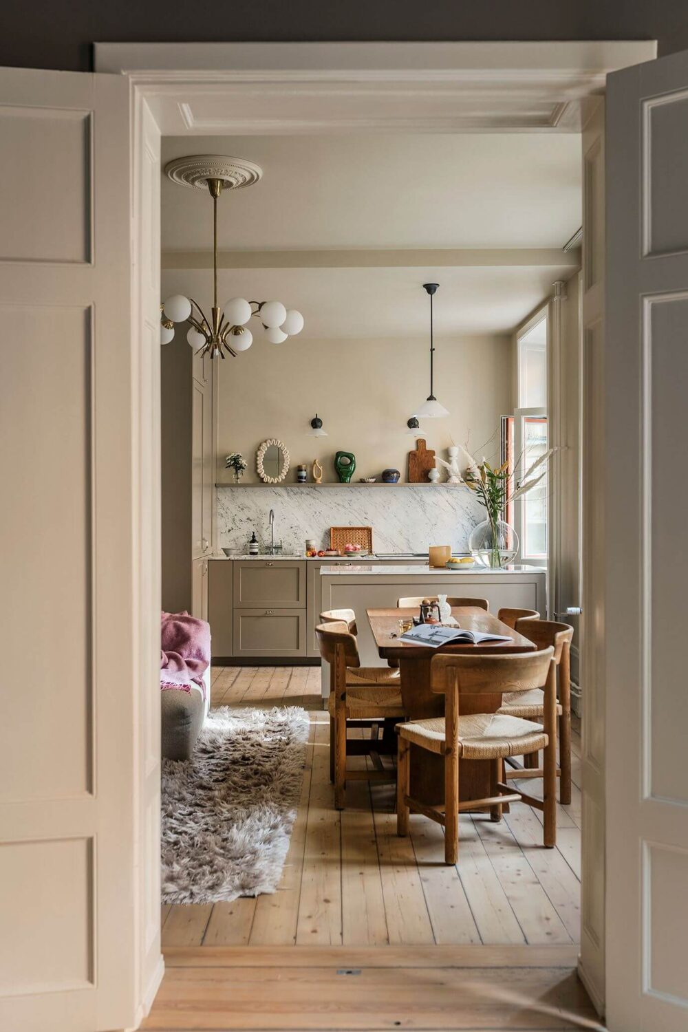 A Cozy Scandinavian Apartment with a Cobalt Color Accent 7 wooden floor scandinavian living room kitchen