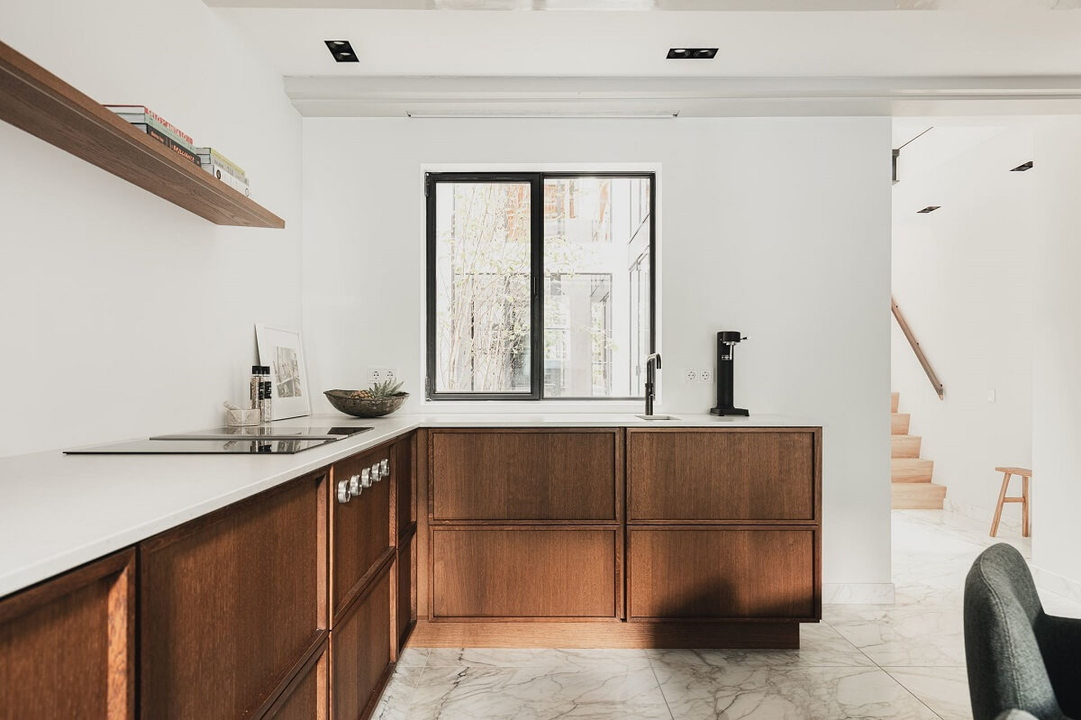 A Luxurious Amsterdam Canal House with High Ceilings 13 wooden kitchen cabinets indoor window