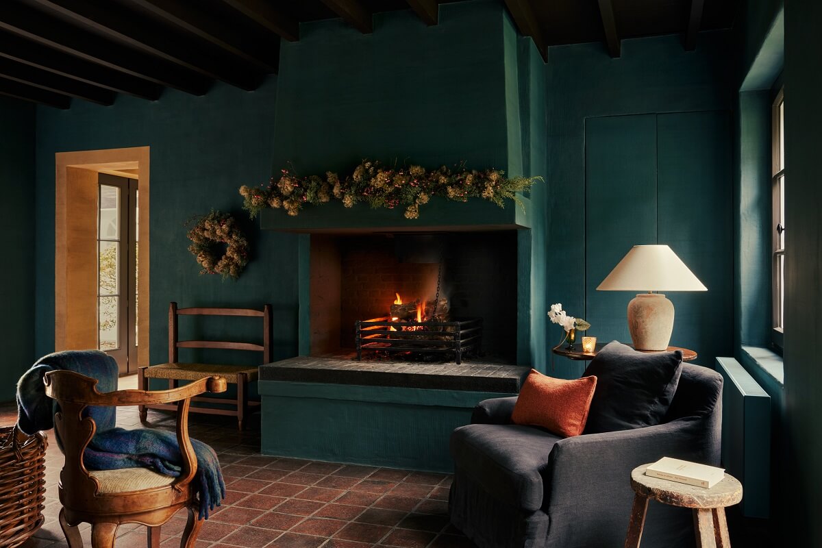 Zara Home Christmas Collection 2023 7 zara-home-christmas-2023-teal-living-room-terracotta-floor-fireplace-nordroom