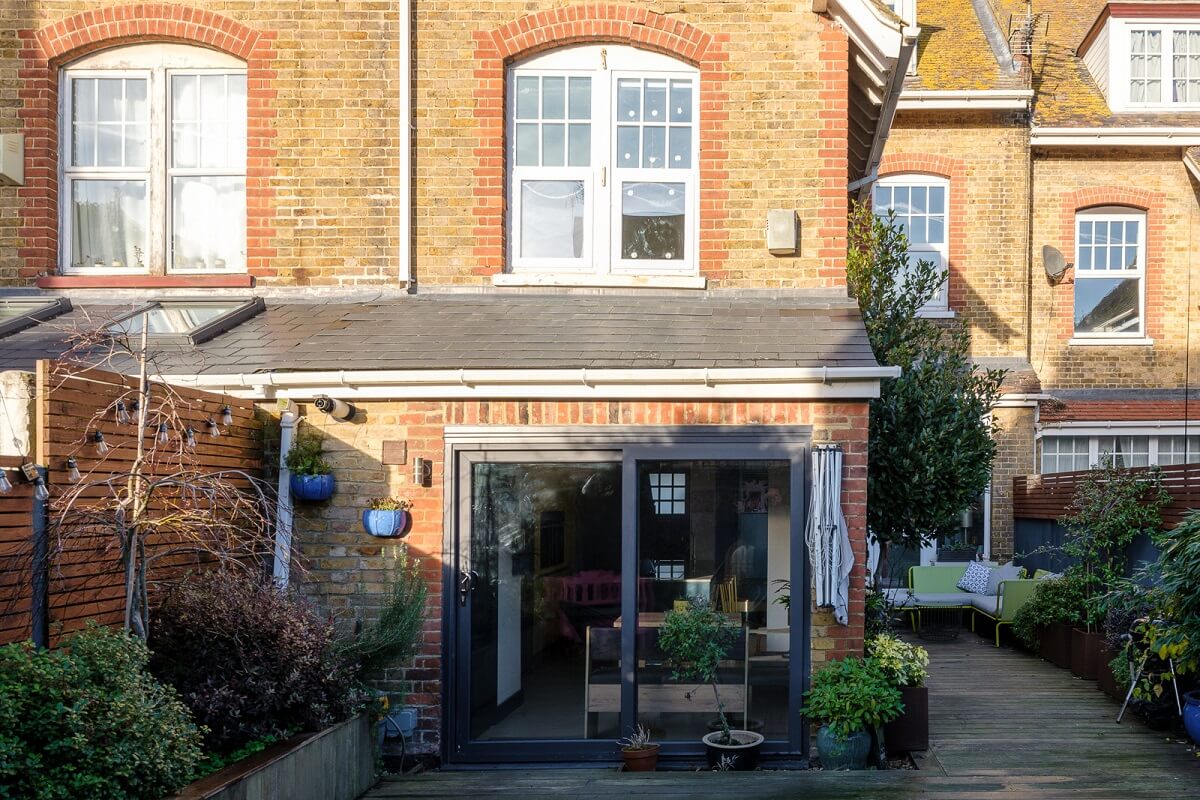 Playful Colors in a Historic Home in Kent 27 back-facade-townhouse