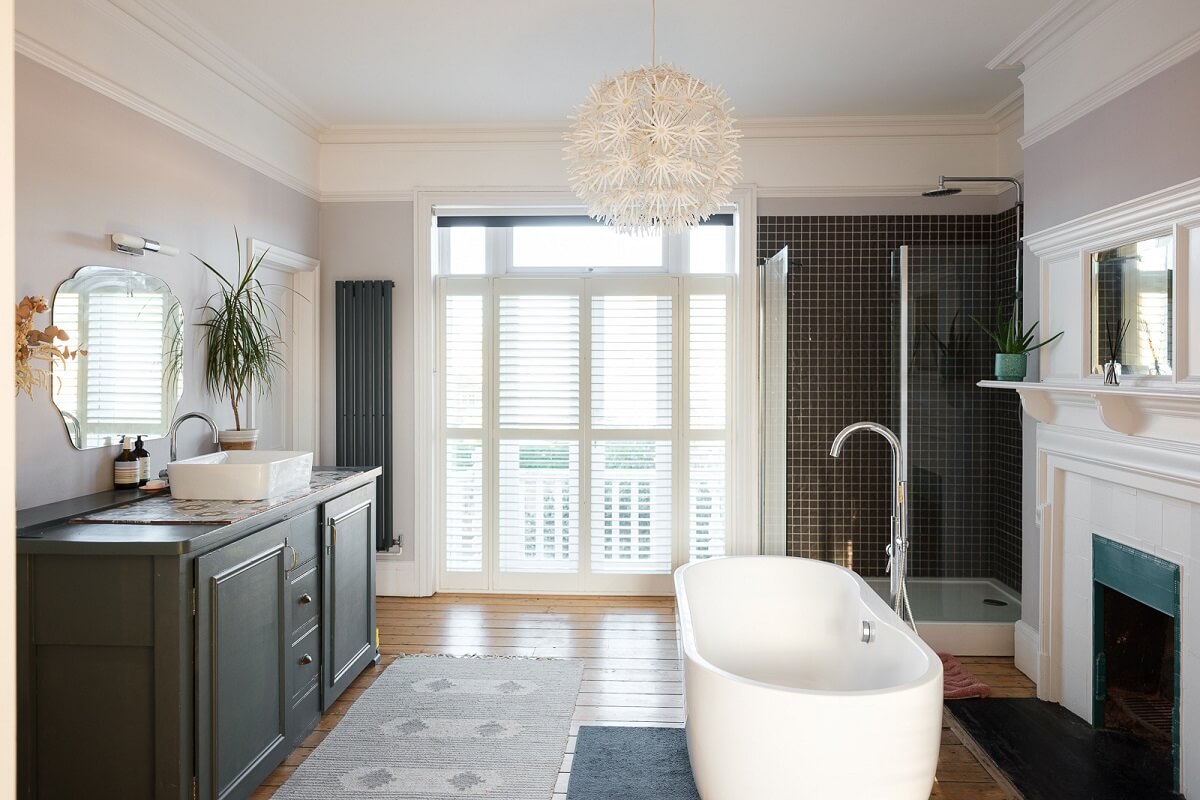 Playful Colors in a Historic Home in Kent 15 bathroom-freestanding-bath-black-tiles-nordroom