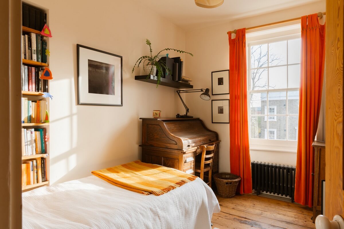 Cozy Cottage Style in a London House with a Garden 19 bedroom-orange-curtains