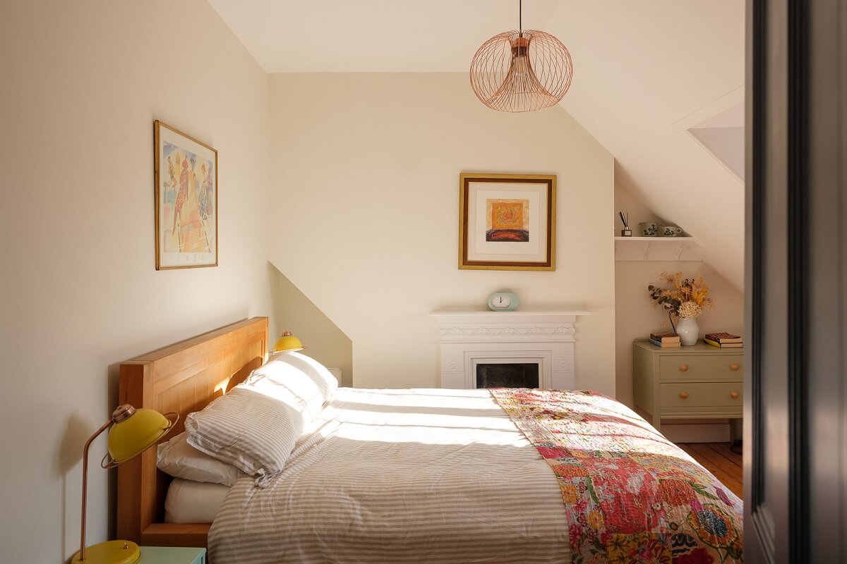Playful Colors in a Historic Home in Kent 17 bedroom-slanted-ceiling