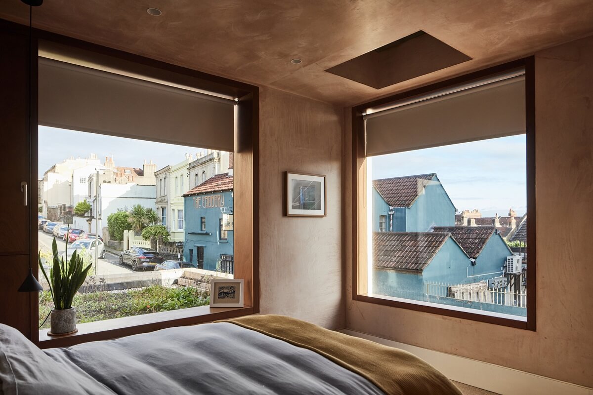 A Modern House Centered Around a Courtyard 25 bedroom-two-large-windows-street-view-nordroom