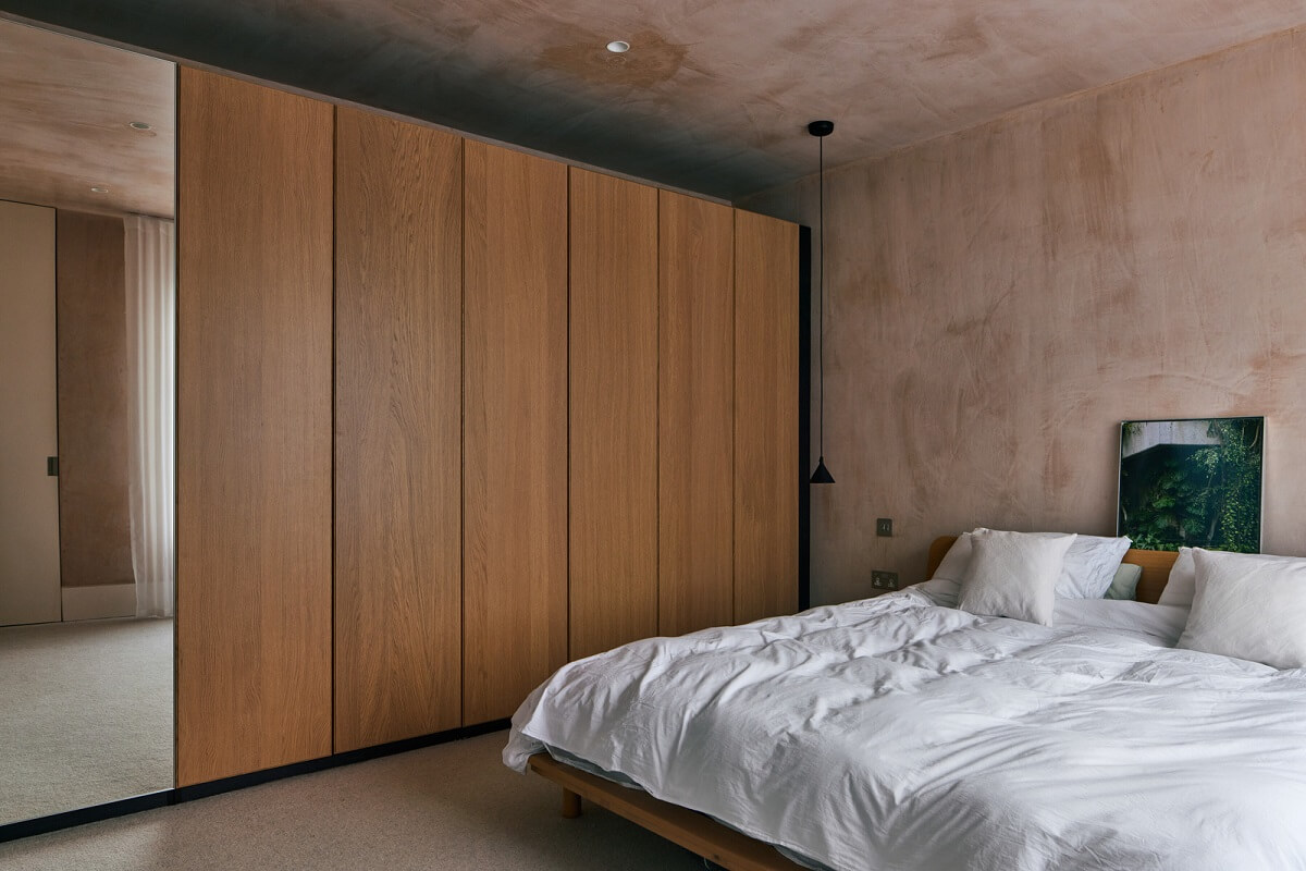 A Modern House Centered Around a Courtyard 19 bedroom-wall-of-wardrobes
