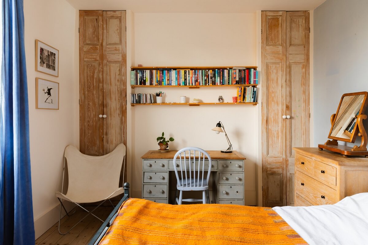Cozy Cottage Style in a London House with a Garden 18 bedroom-with-desk-yellow-bedspread-nordroom