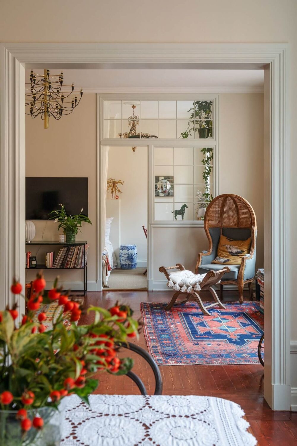 A Cozy Swedish Apartment with a Green Kitchen 16 beige living room with mahogany floor