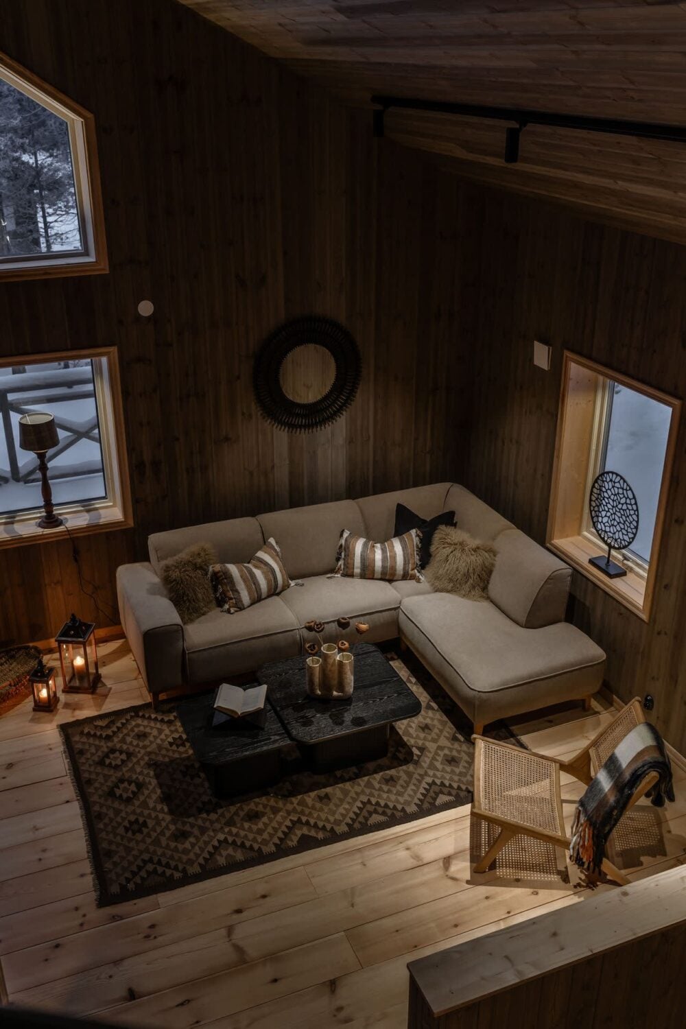 A Cozy Log House in Sweden 1 cozy-log-house-living-room-at-night-scandinavian-style-nordroom