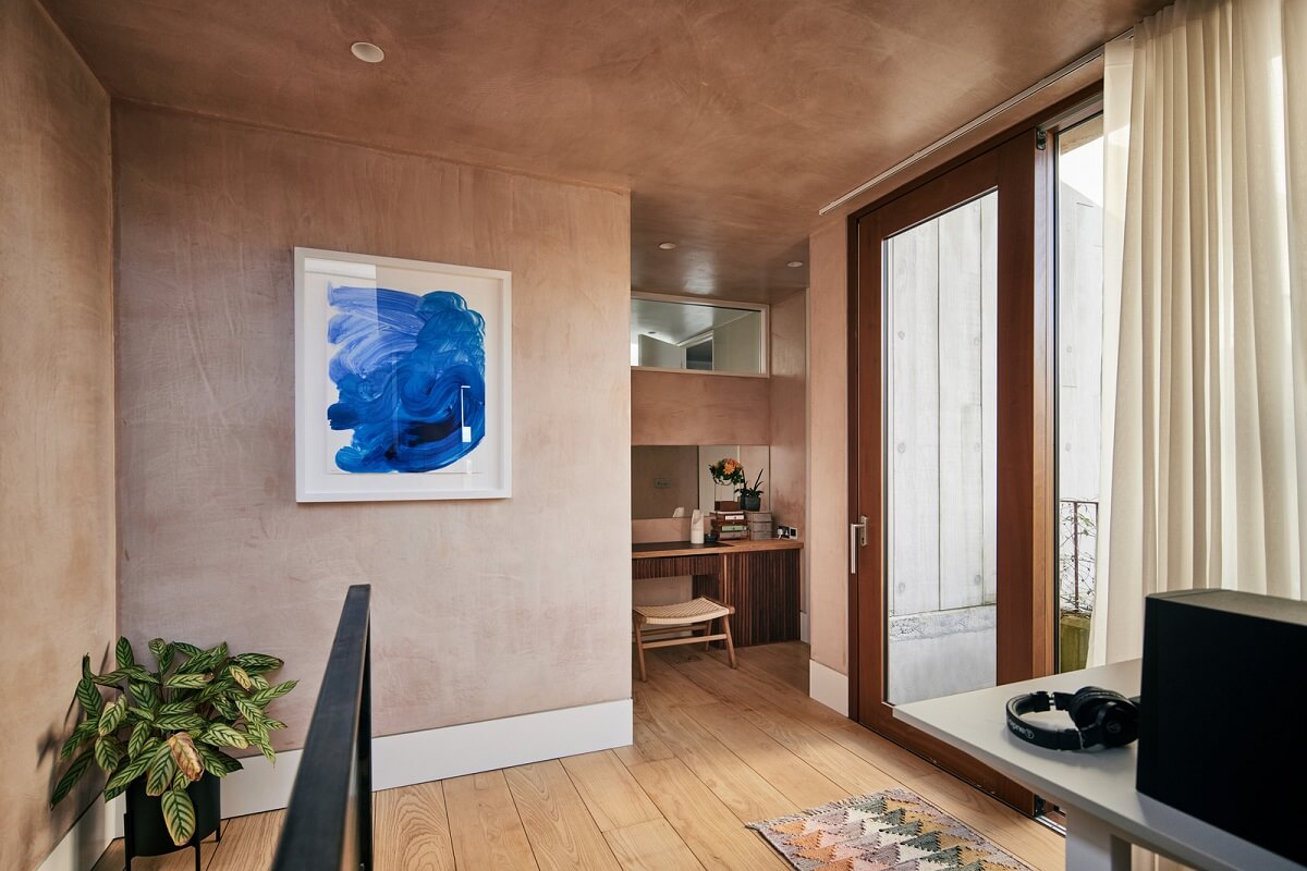 A Modern House Centered Around a Courtyard 15 first-floor-landing-desk-nordroom